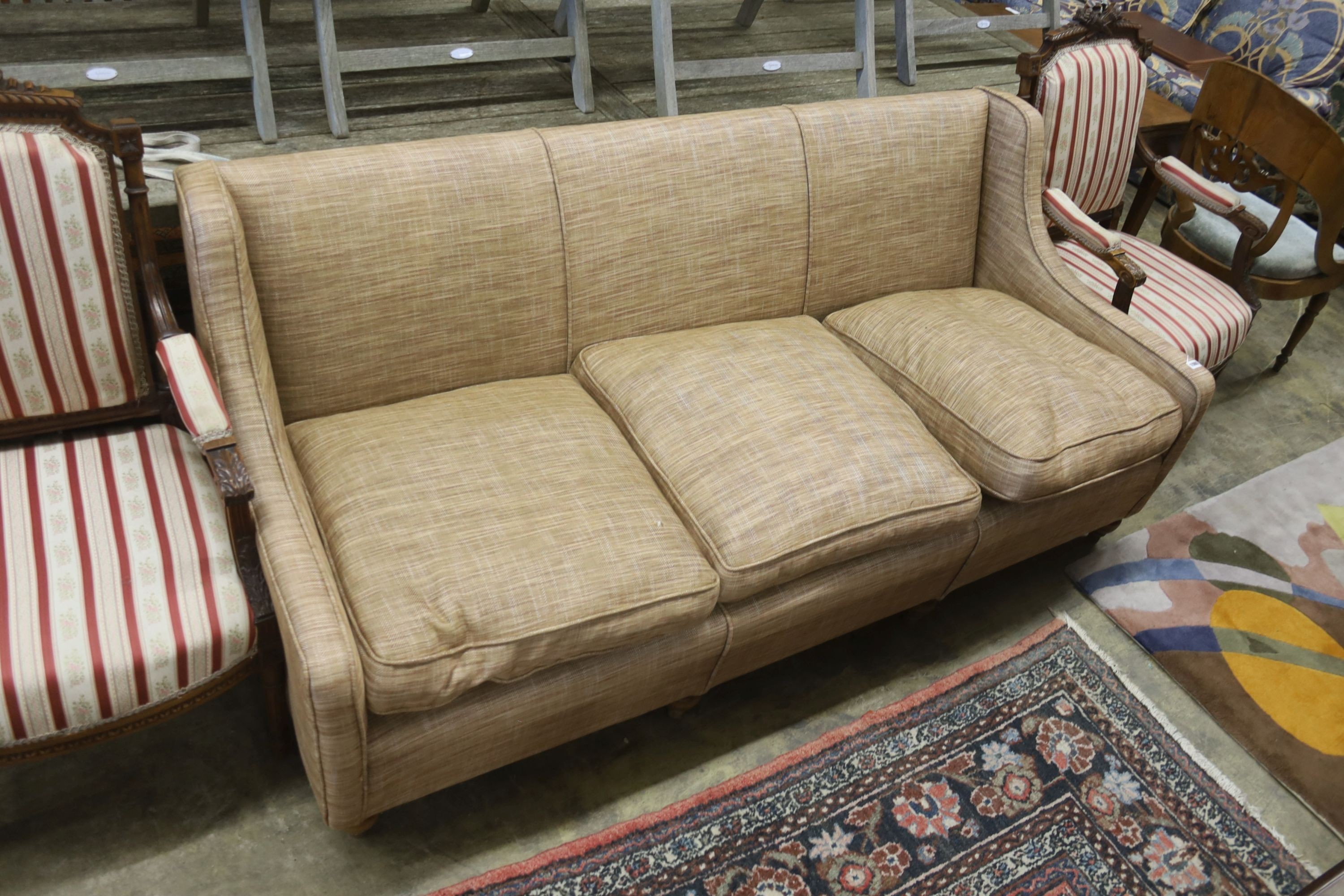 A contemporary upholstered three seater settee, width 190cm, depth 84cm, height 80cm